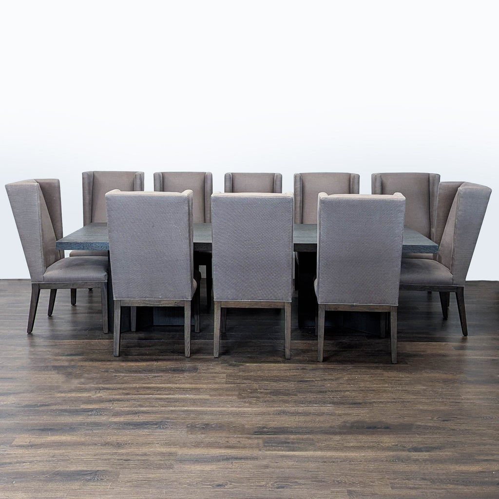 Modern Restoration Hardware dining set with a wood table and ten gray high-back chairs for a stylish dining room.  