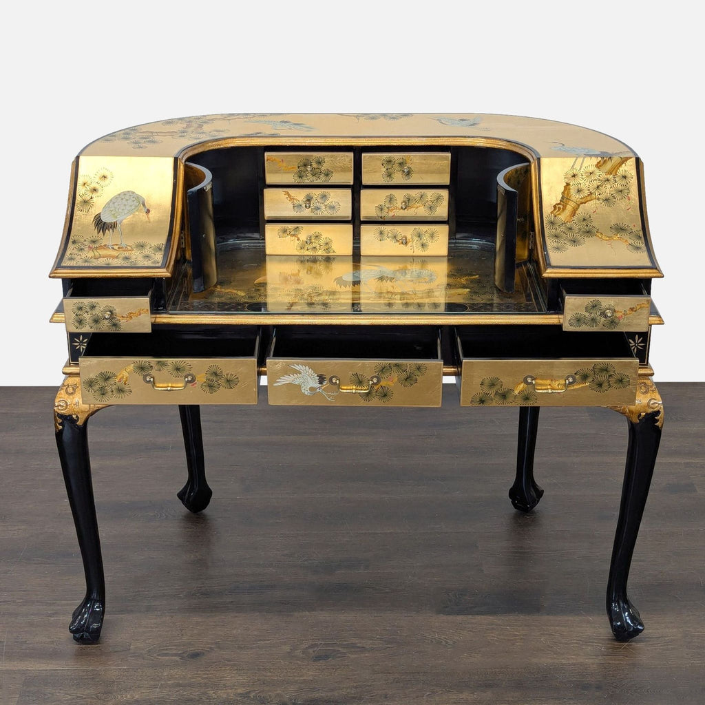 Elegant hand-painted desk with gold finish, floral crane motifs, and several storage drawers; from China Furniture Online.  