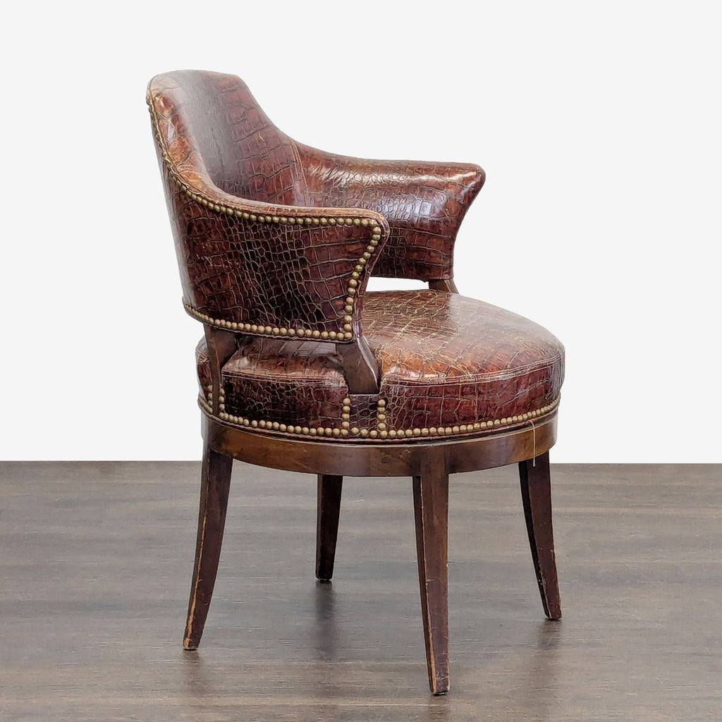 Classic lounge chair featuring crocodile-pattern brown leather, brass accents, and elegant wood legs.  