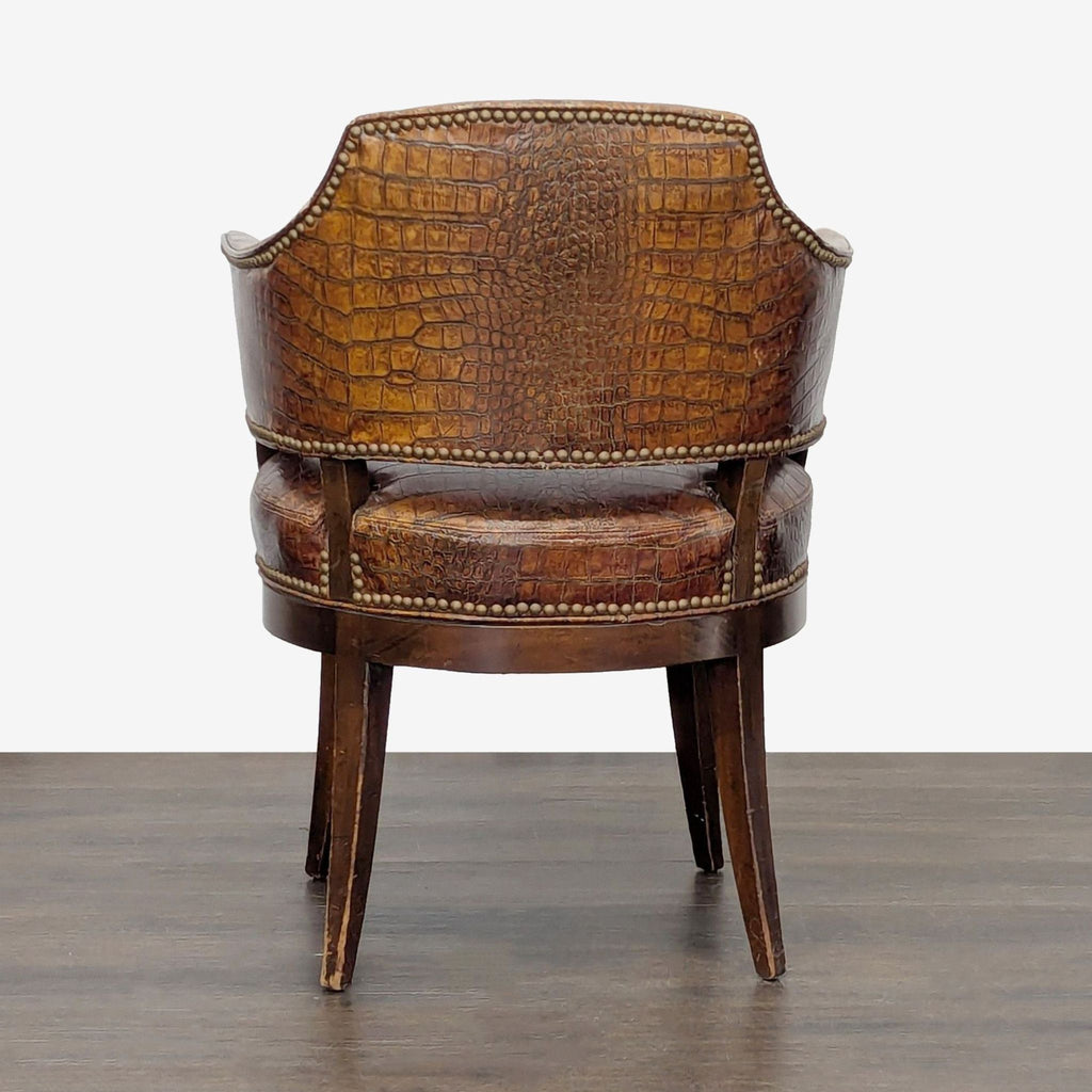 Vintage-inspired brown leather lounge chair with crocodile texture, brass details, and stable wood base.