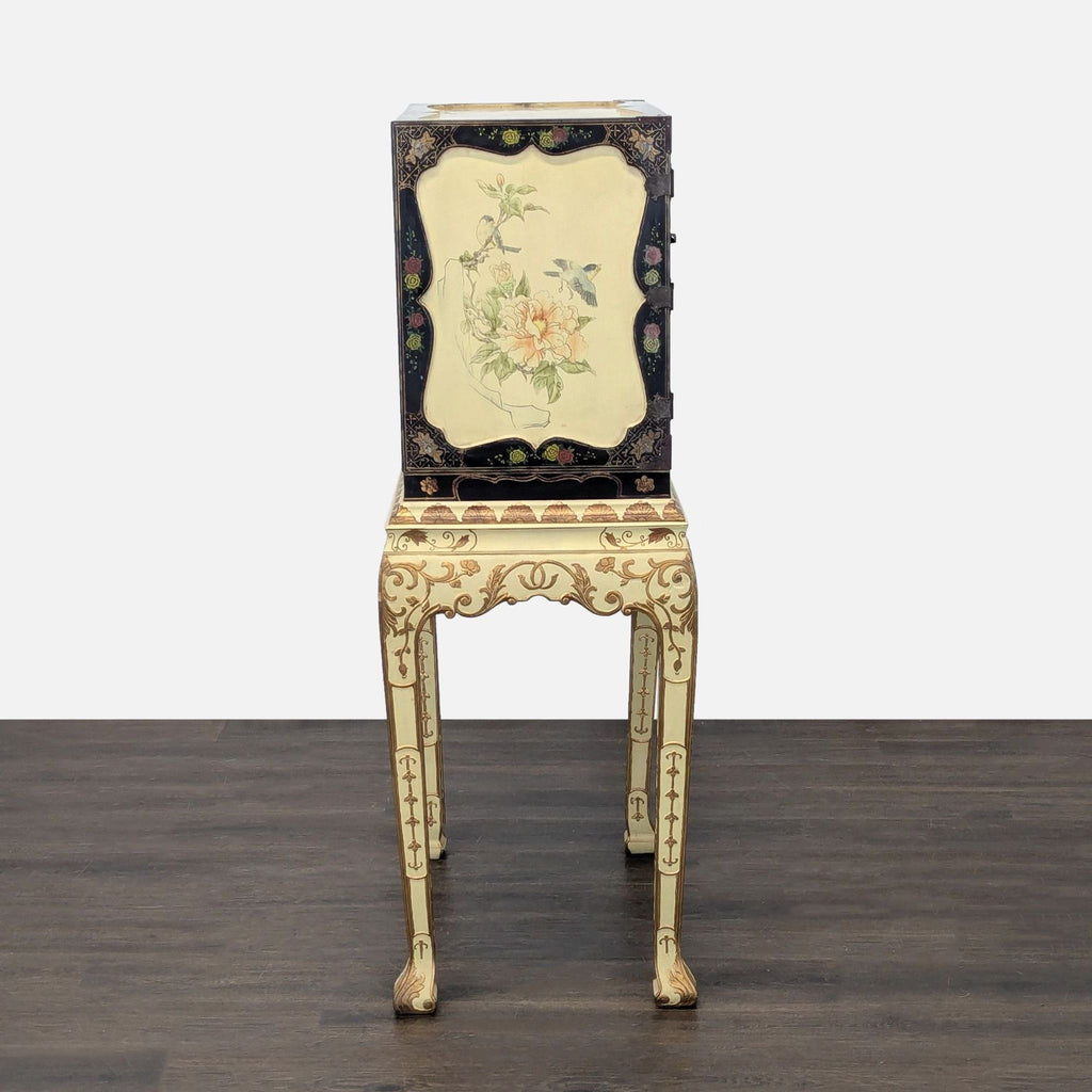 Asian-inspired hand painted chest on a matching stand, with multiple drawers, intricate designs, and metallic accents.