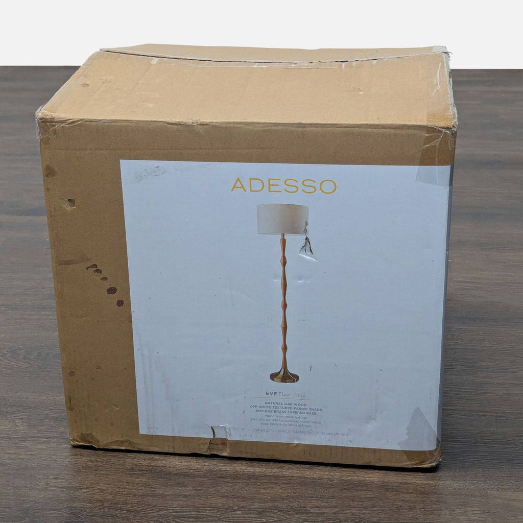 Modern floor lamp featuring a natural oak base and simple white fabric shade, designed for stability and style.