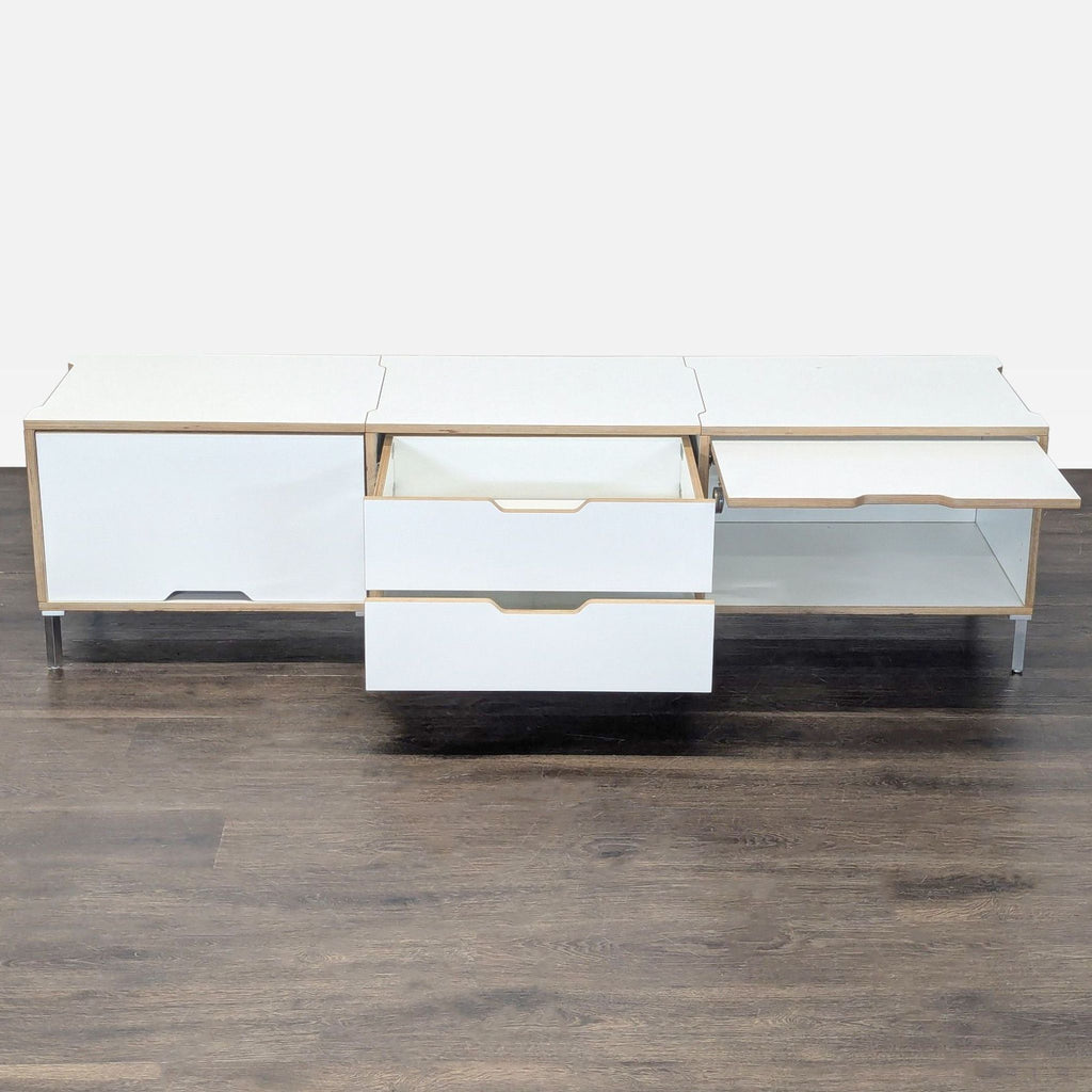 Scandinavian Designs cabinet featuring white finish, light wood details, two drawers, and side compartments.