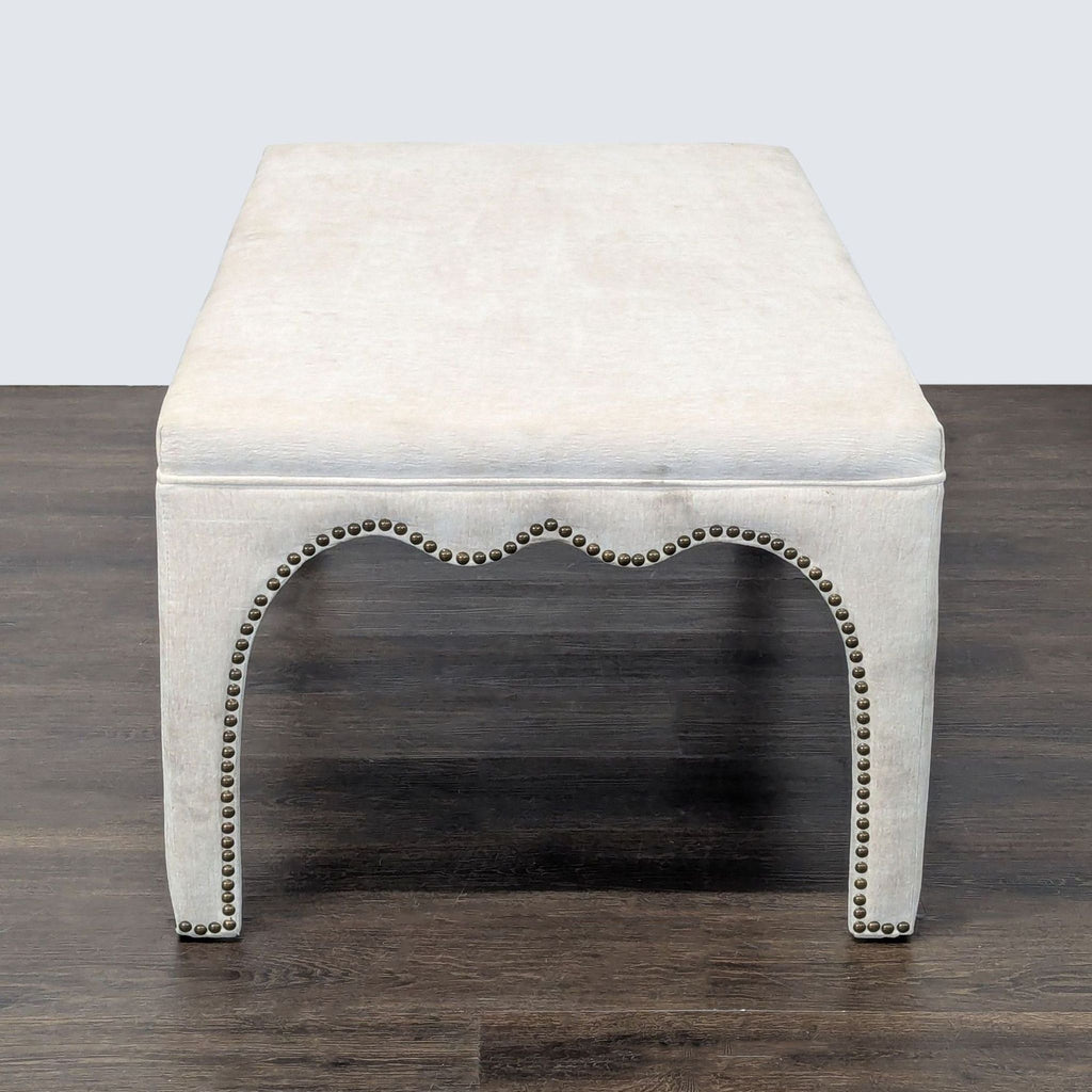 Chic upholstered bench featuring a scallop apron and nailhead trim, from TOV Furniture’s bench collection.