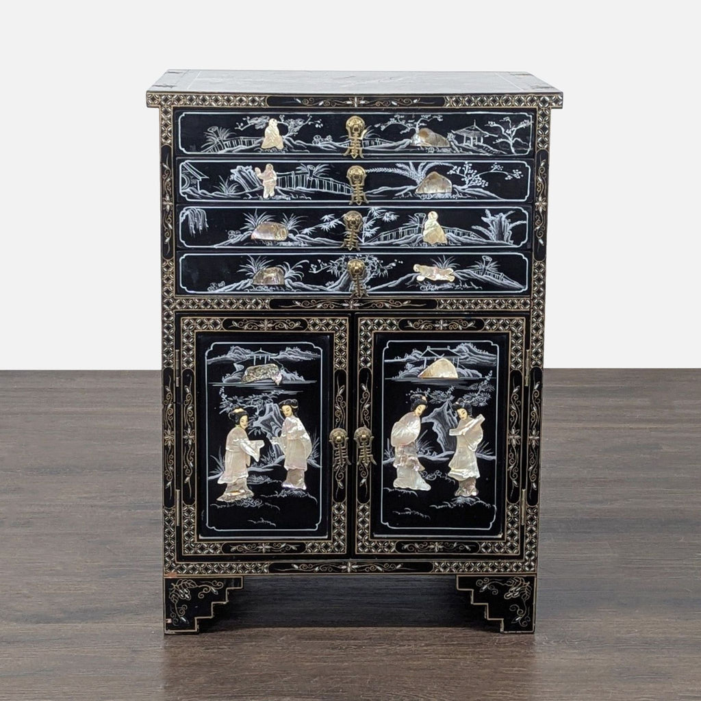 Black lacquer Chinese cabinet with mother-of-pearl inlays, four drawers, and two doors for storage.