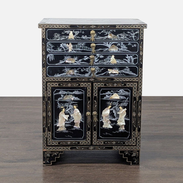 Black lacquer Chinese cabinet with mother-of-pearl inlays, four drawers, and two doors for storage.