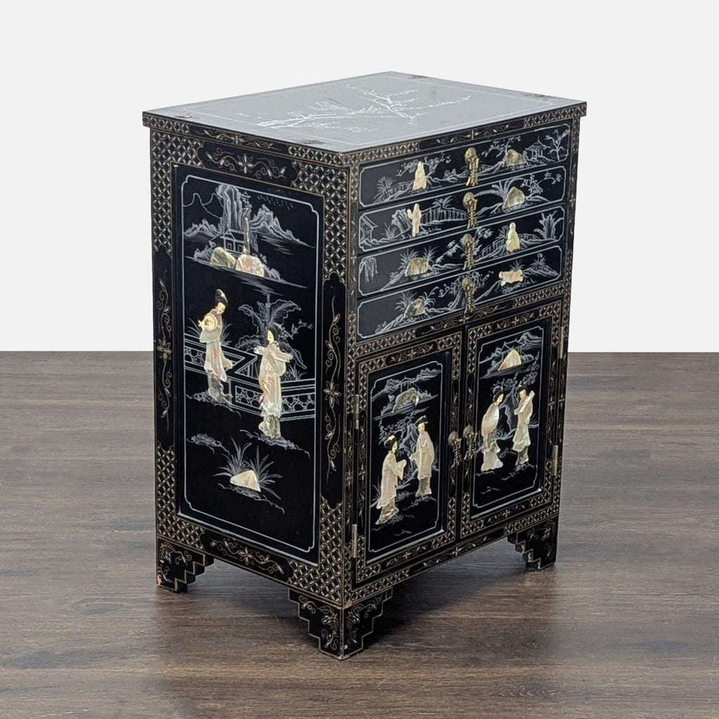 Classic black cabinet with ornate mother-of-pearl inlay, offering four drawers and a spacious two-door compartment.