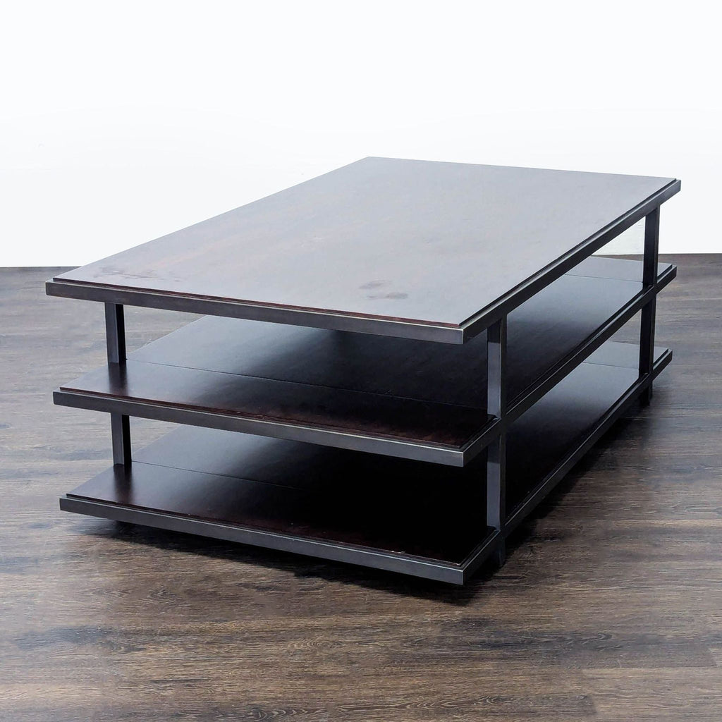 Modern coffee table featuring wooden shelves supported by a metal frame.