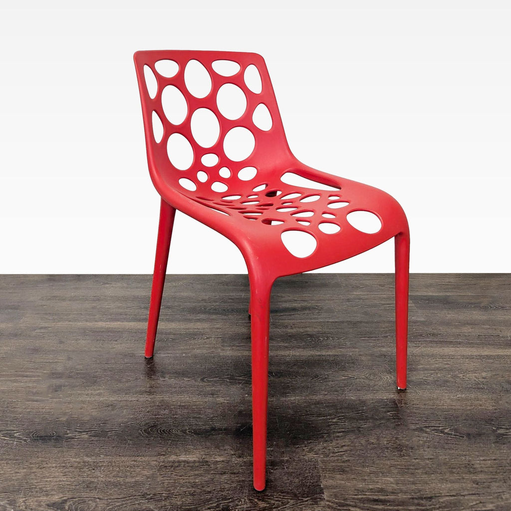 Red Plastic Dining Chair with Circle Cut-Outs