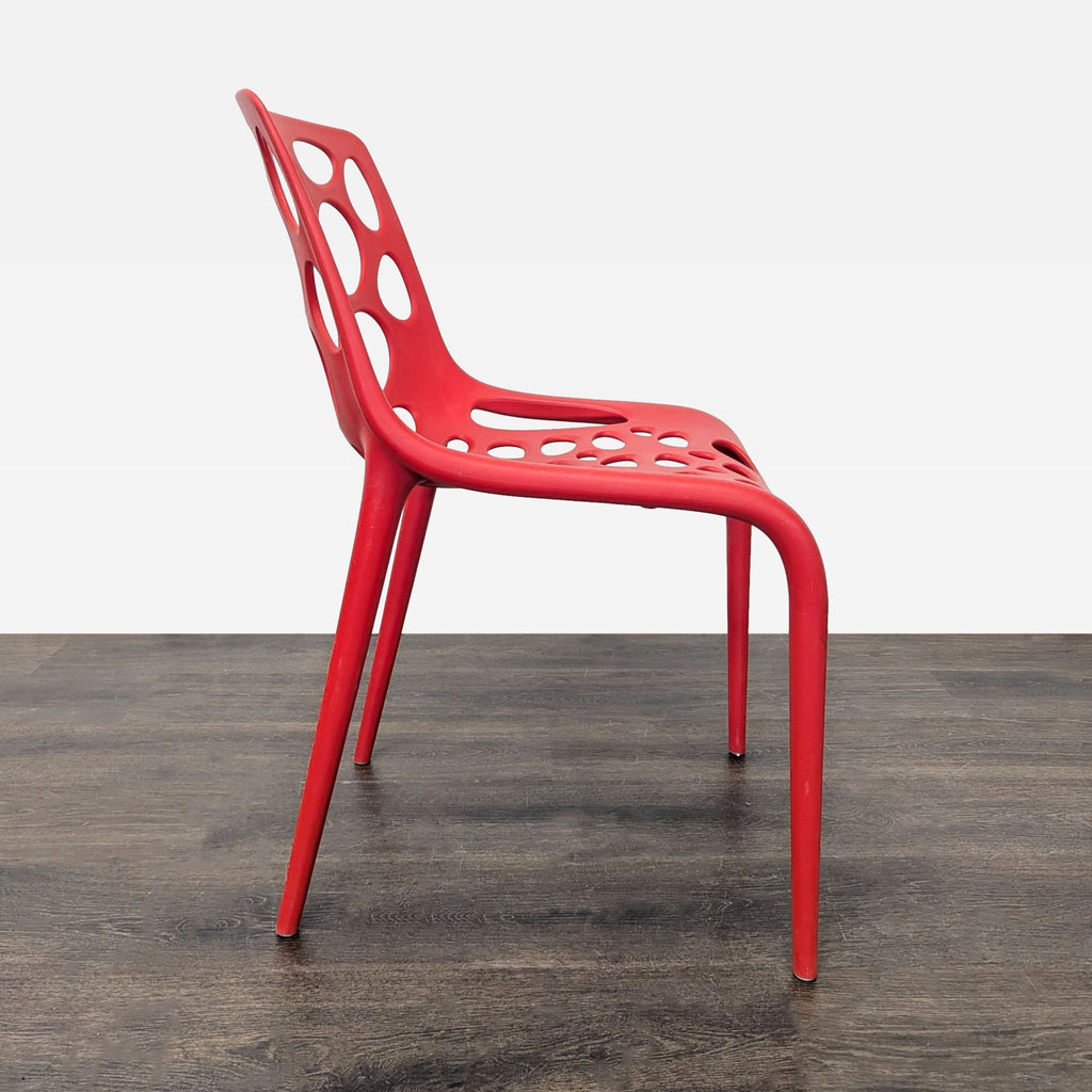 Red Plastic Dining Chair with Circle Cut-Outs