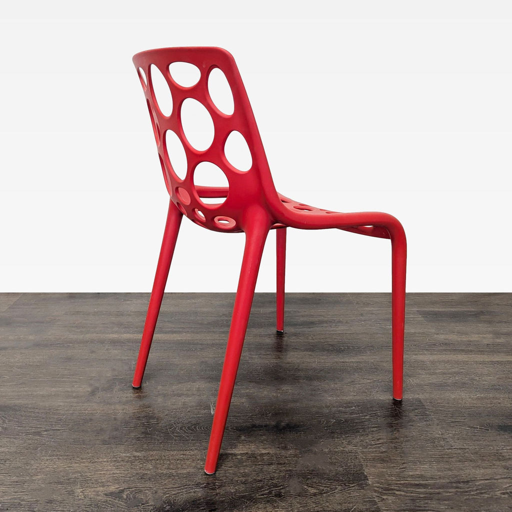 Red Plastic Dining Chair with Circle Cut-Outs