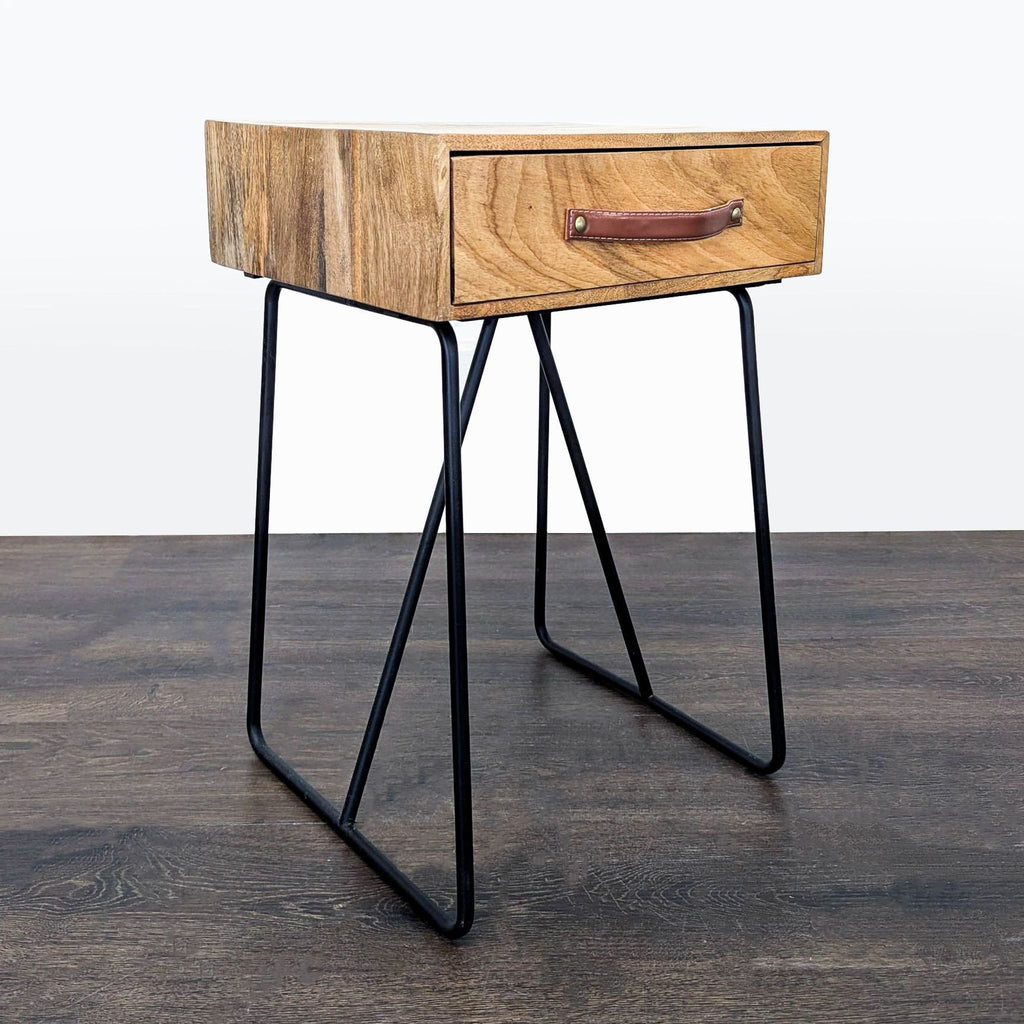 3. Acacia wood end table with a functional leather handle, suitable for contemporary spaces.