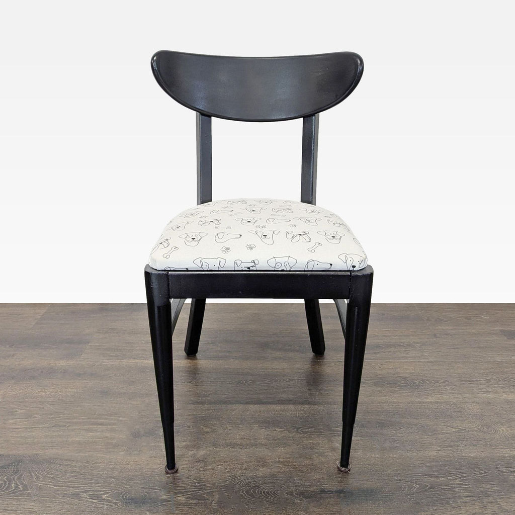 Mid-century dining chair featuring playful dog print upholstery.