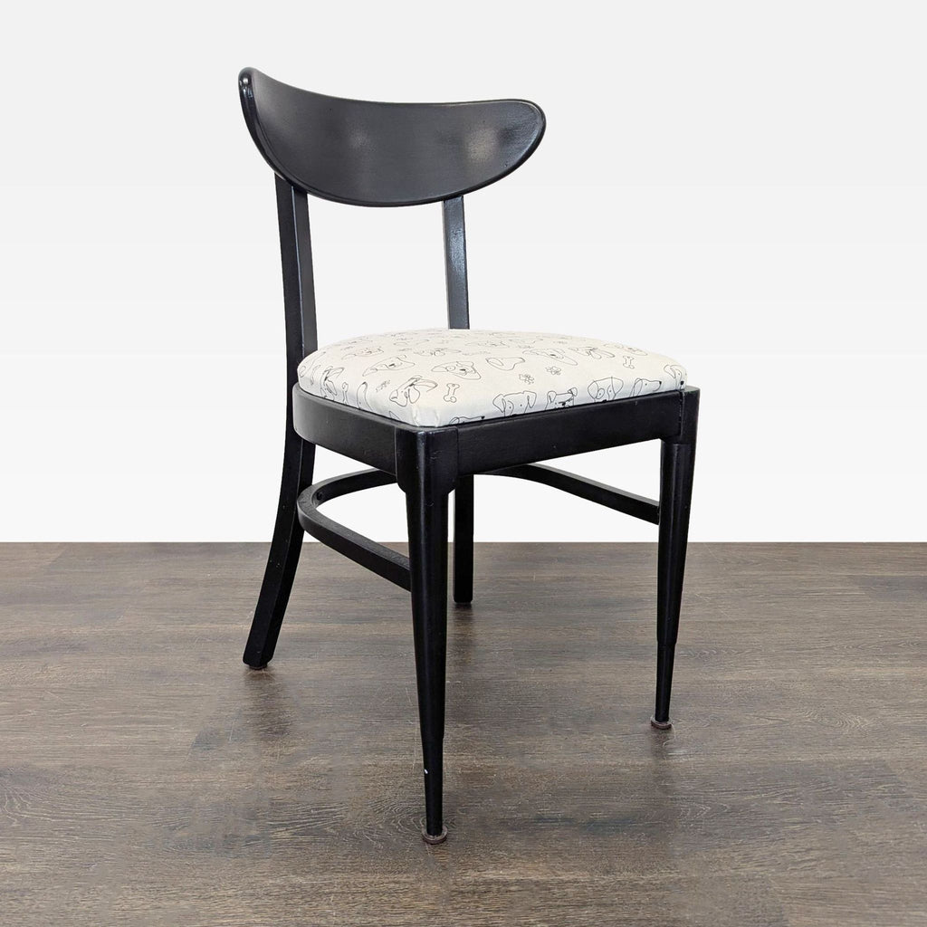 Retro dining chair with unique dog print cushioning, mid-century modern design.