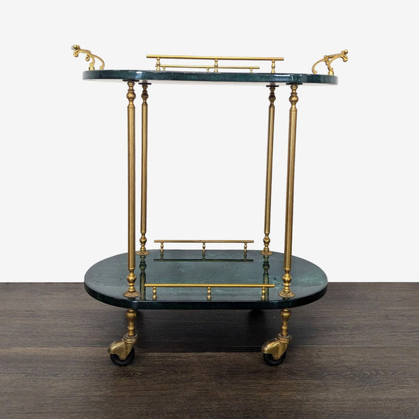 Glossy green goatskin serving trolley on brass columns and castors, in Hollywood Regency style by Aldo Tura.
