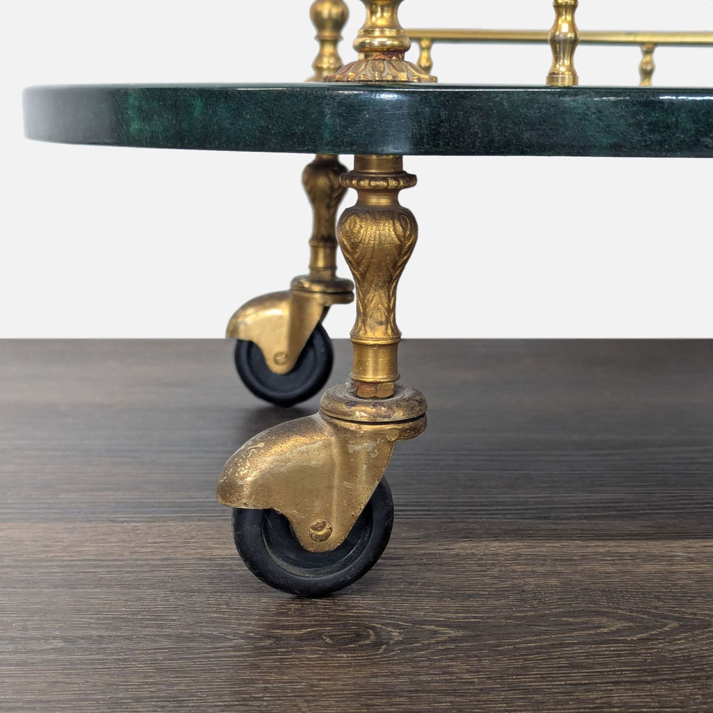Elegant Art Deco-inspired side table with lacquered green goatskin, brass supports, and wheels, made by Aldo Tura.