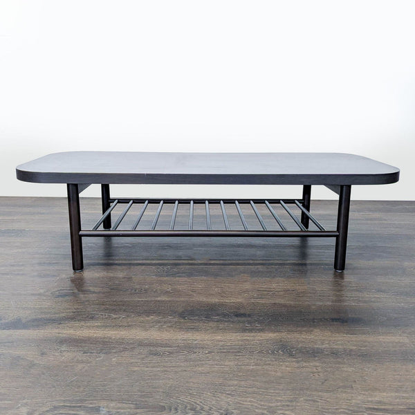 Ikea coffee table by Henrik Preutz in solid beech, featuring a ribbed lower shelf and protective lacquer finish.  
