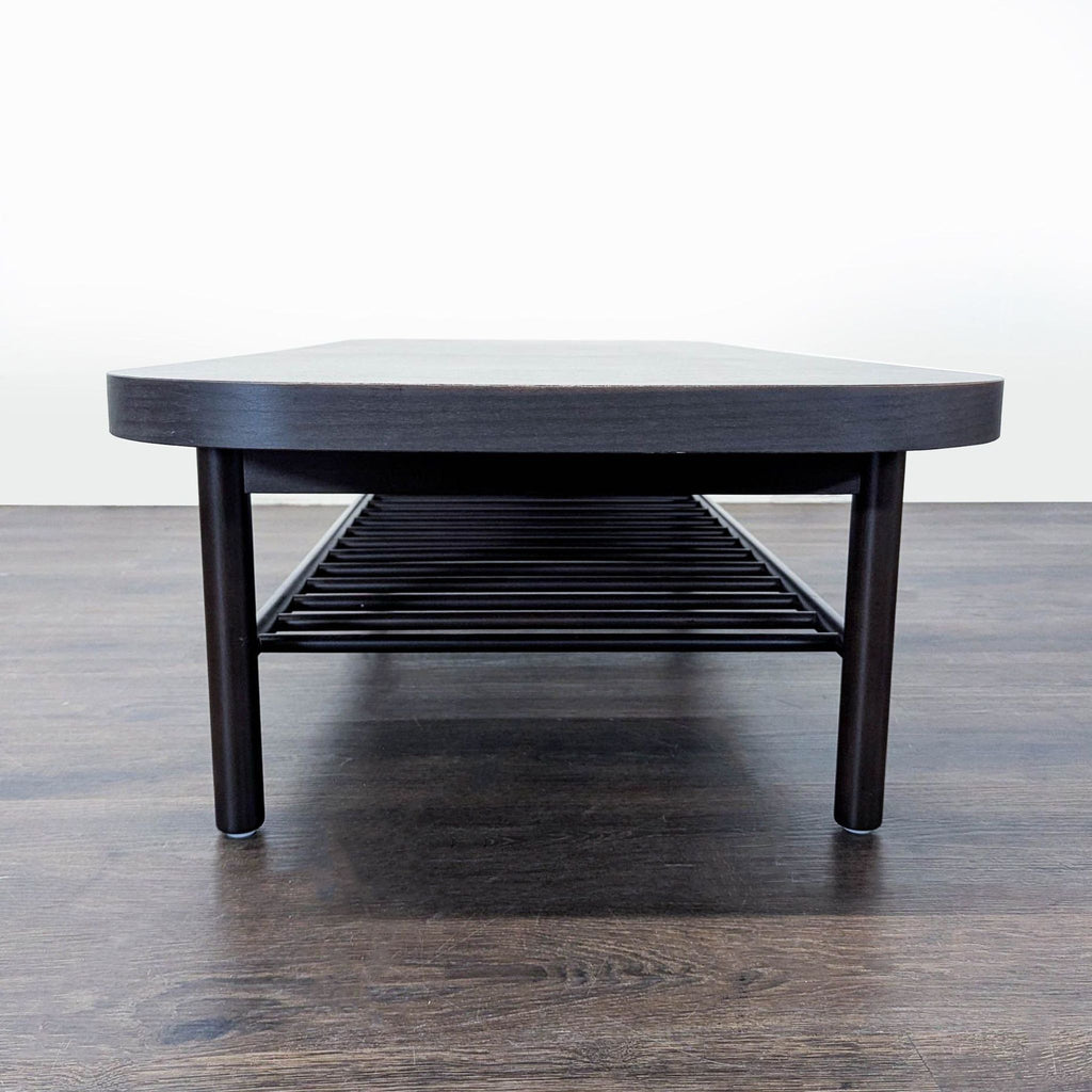 Beech wood coffee table with ribbed storage shelf, lacquer coated; a Henrik Preutz design from Ikea.