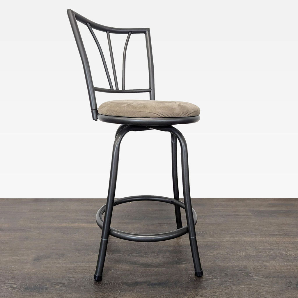 Swivel stool featuring a padded seat and sleek design, ideal for kitchens or casual seating areas.