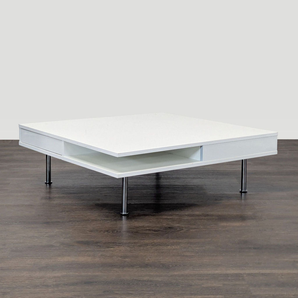 Rectangular high gloss white IKEA coffee table with two drawers and a lower shelf, designed by Tord Björklund.