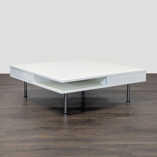 Rectangular high gloss white IKEA coffee table with two drawers and a lower shelf, designed by Tord Björklund.