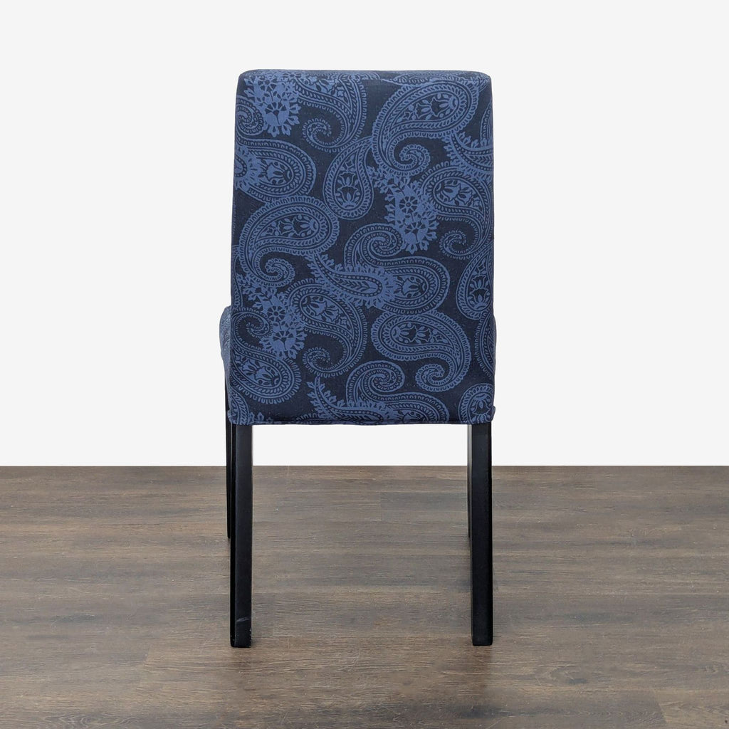 Ikea Parsons dining chairs with paisley upholstery and sturdy wood bases for dining spaces.