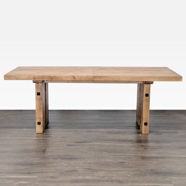 Pottery Barn recycled wood dining table with metal hardware, shown fully extended to seat eight people.