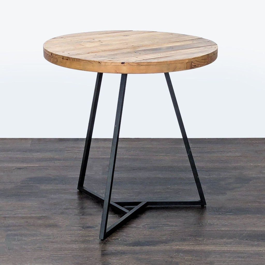 West Elm dining table with reclaimed pine top and sturdy metal base.  