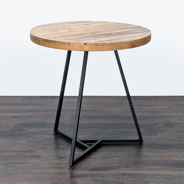 West Elm dining table with reclaimed pine top and sturdy metal base.  