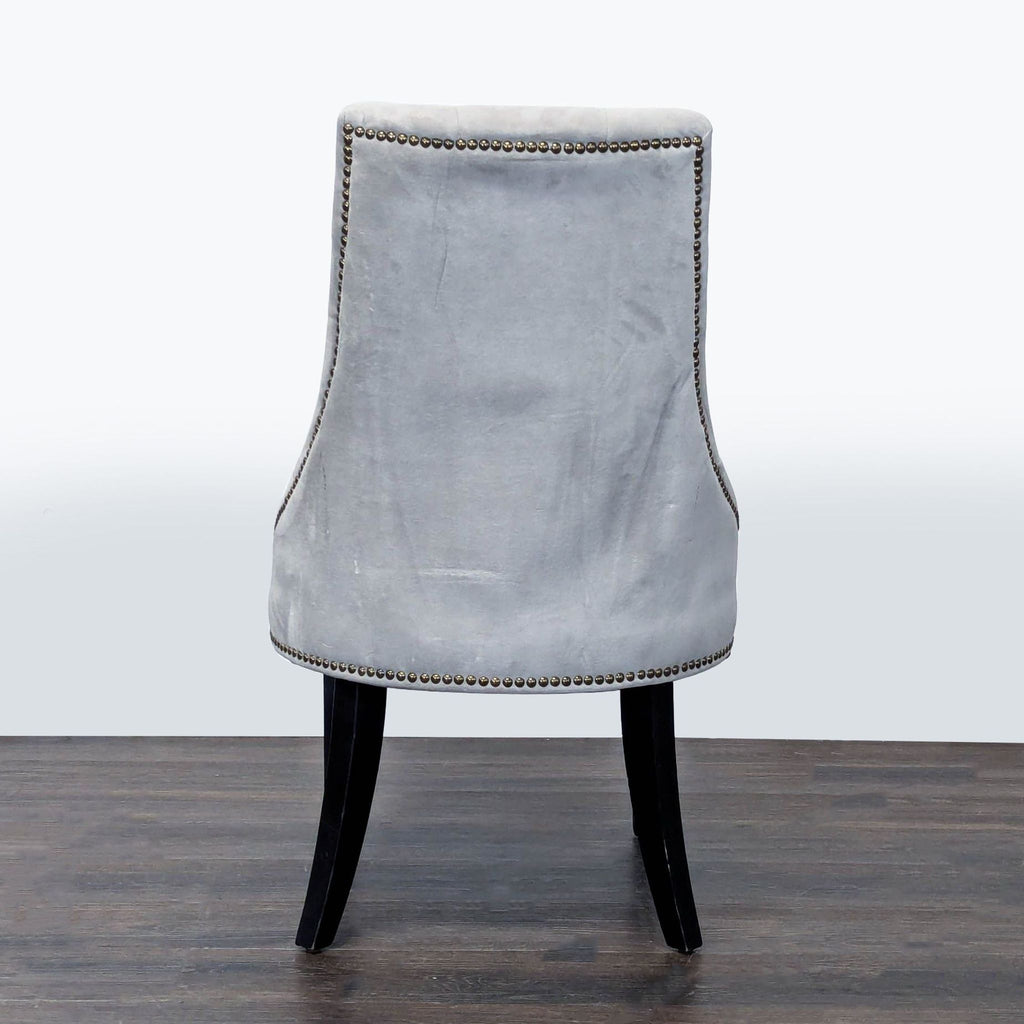 2. Elegant dining chair from World Market, featuring a minimalist design and neutral upholstery.  