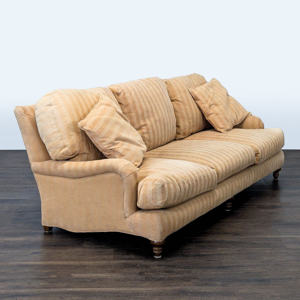 Classic beige striped 3-seater sofa featuring plush cushions and sturdy wood legs for a cozy living room.