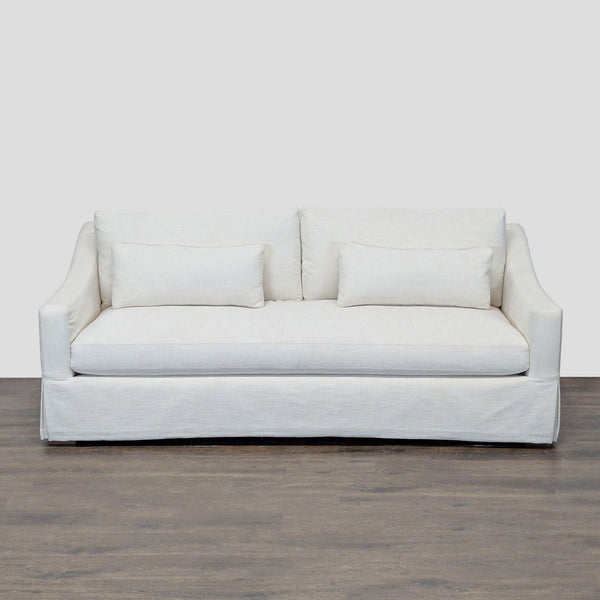 Restoration Hardware white loveseat with removable slipcover, two cushions, and lumbar pillows, skirted base design.  