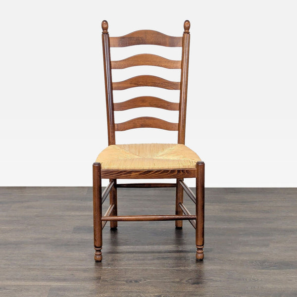 Pottery Barn Italian-made dining chair with a woven rush seat and wooden frame.  