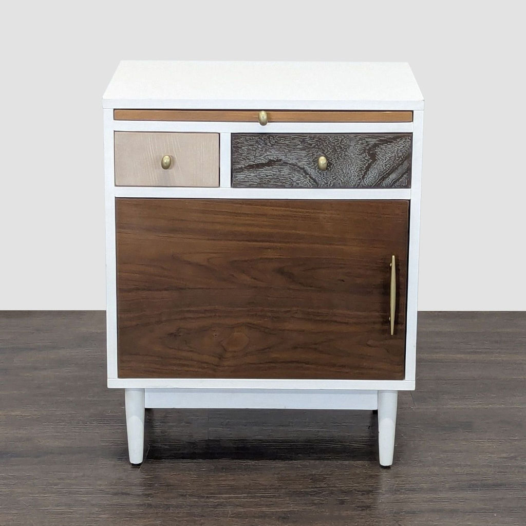 West Elm end table with two small drawers, a pull-out tray, and a lower cabinet with shelves.