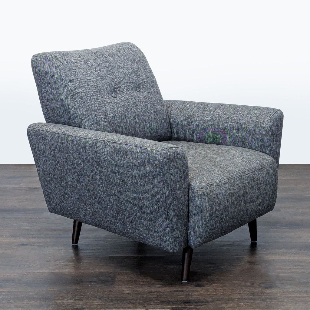 Modern Jason Furniture lounge chair in soft grey fabric, designed for comfort and style in any lounge.