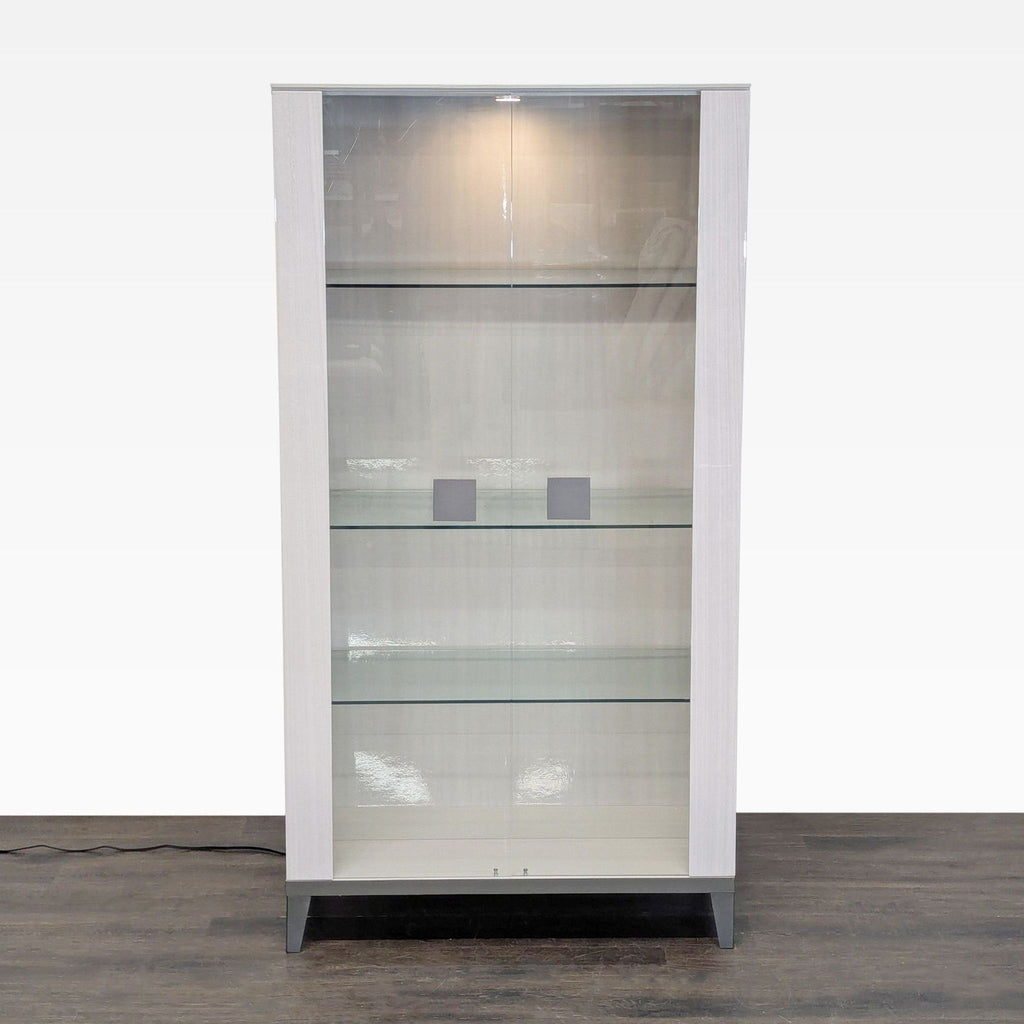 Wooden cabinet by Alf Italia with glass doors, internal glass shelves, and modern metal hardware, electrified.