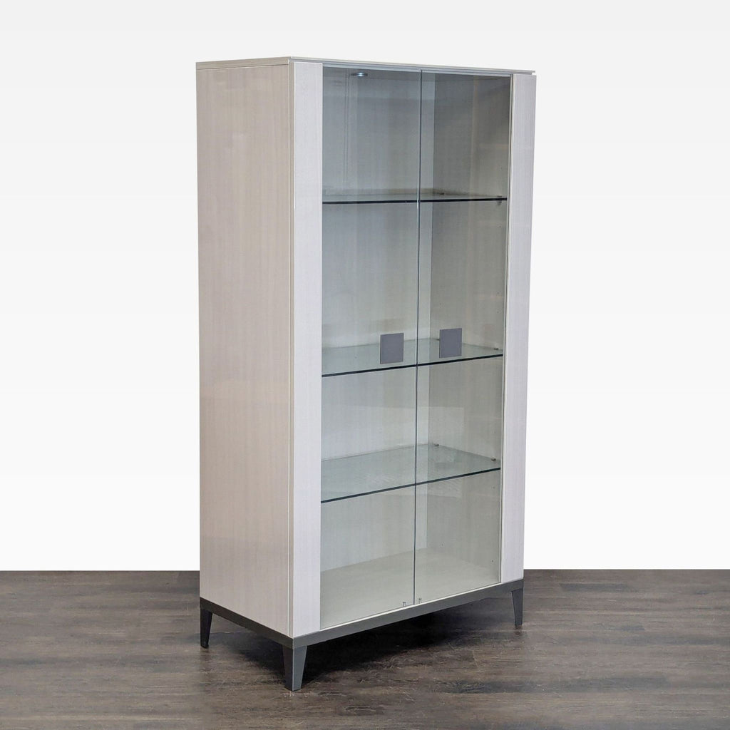Contemporary cabinet in wood with glass doors and shelves, metal hardware, electrified; Alf Italia brand.