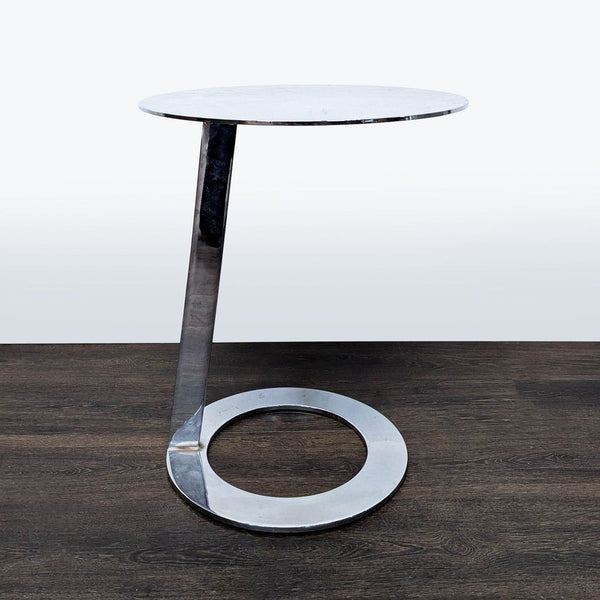 1. Modern side table with a circular white marble top and chrome base, designed with a sleek minimalistic style.