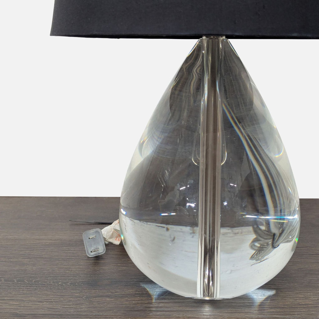 Modern Jonathan Adler table lamp featuring a lead crystal teardrop base and a sleek black lampshade.