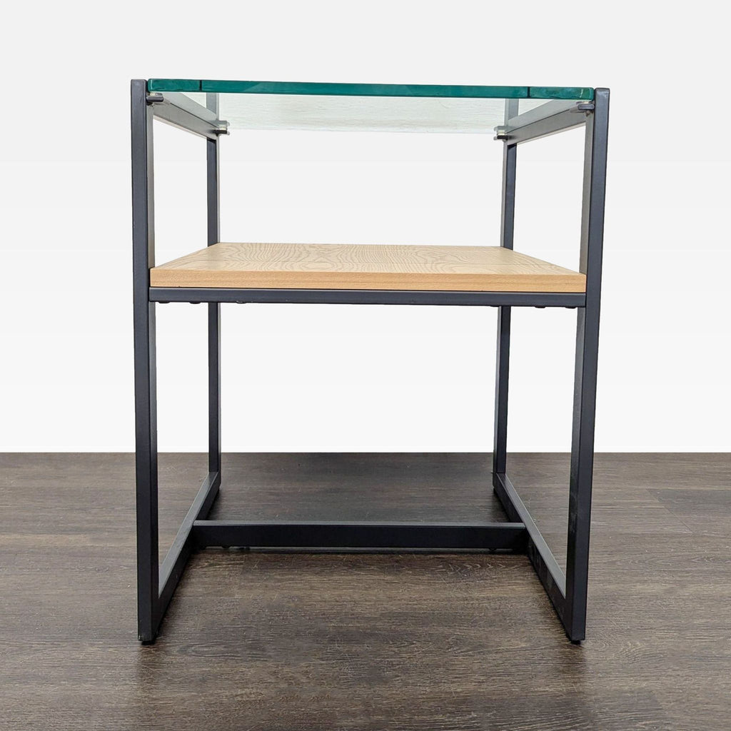 Modern end table with a clear glass top and a natural wood shelf underneath.  