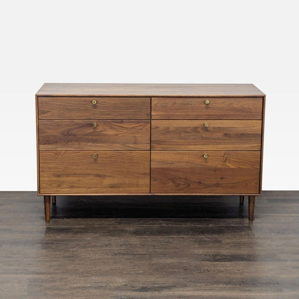 Mid-century modern walnut dresser by Copeland Furniture with six drawers and brass knobs for bedroom storage.