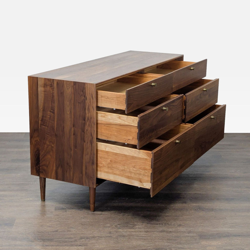 Solid walnut dresser from Copeland Furniture featuring six spacious drawers and sleek brass hardware.