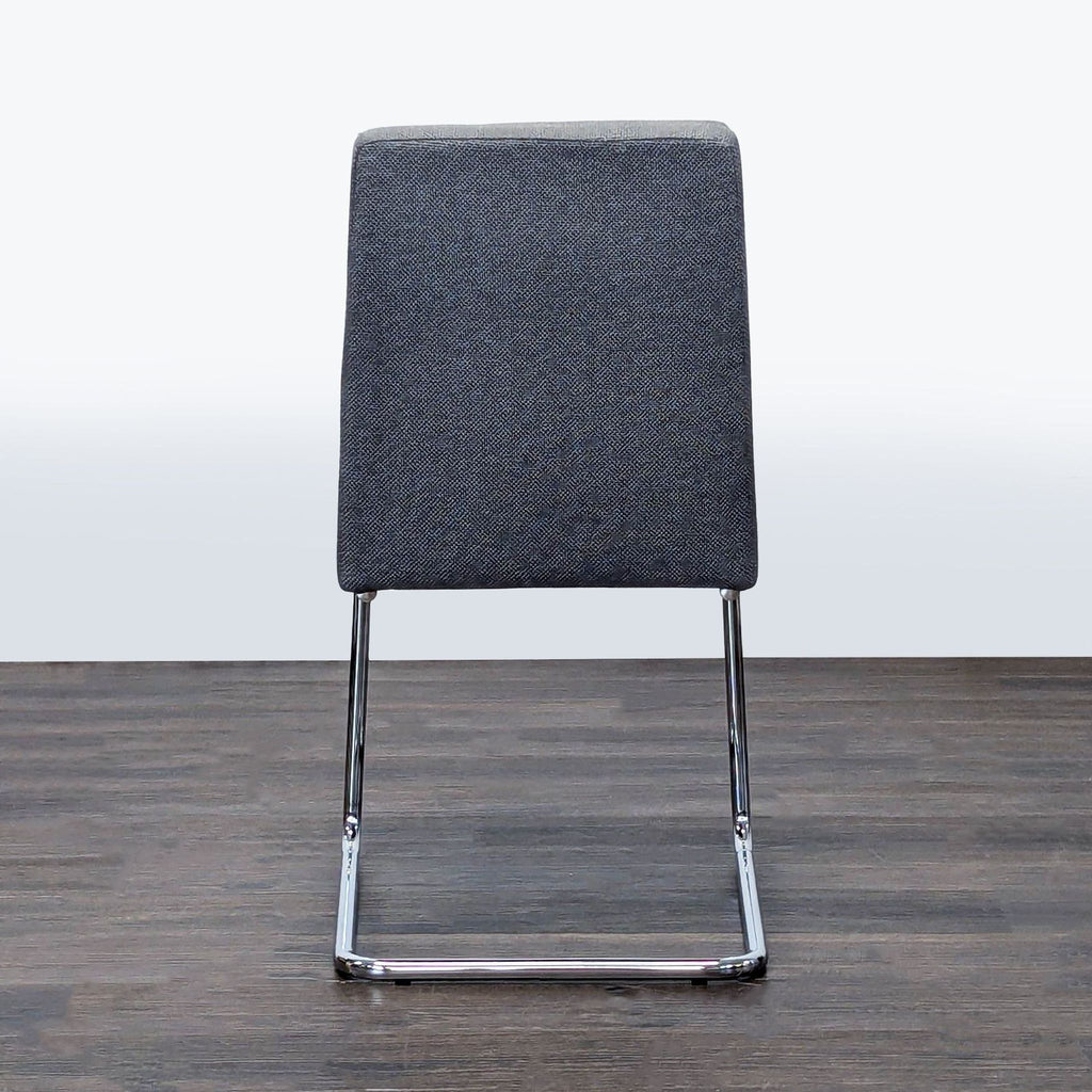 CB2 Button Tufted Dining Chair on a Metal Frame - Accepted Offer (12.99% discount)