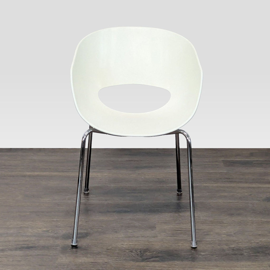 Vintage 1970s Sintesi Orbit dining chair with white resin seat and slender steel tube legs, made in Italy.  