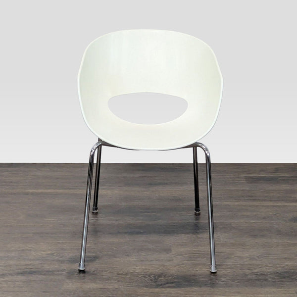 Vintage 1970s Sintesi Orbit dining chair with white resin seat and slender steel tube legs, made in Italy.  