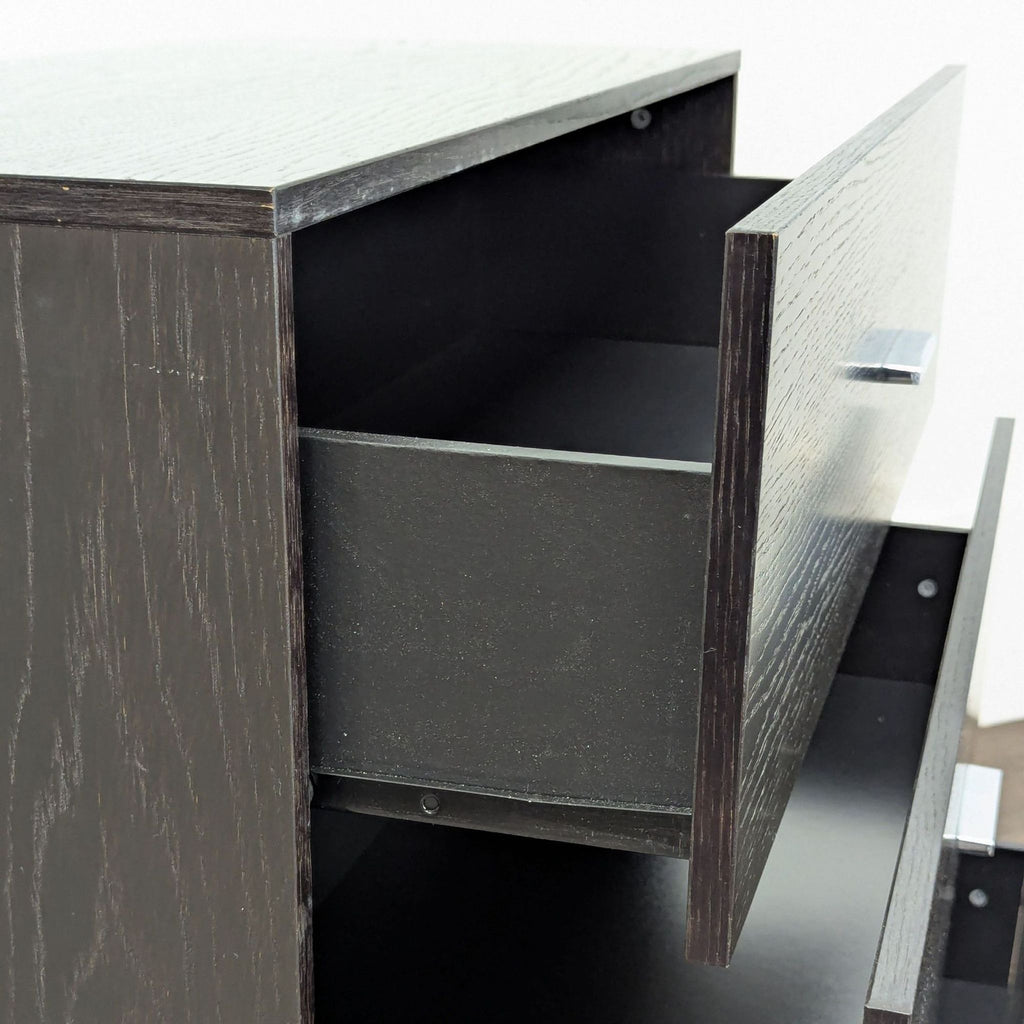 Contemporary dark wood West Elm dresser with three spacious drawers and clean-lined design, perfect for storage.