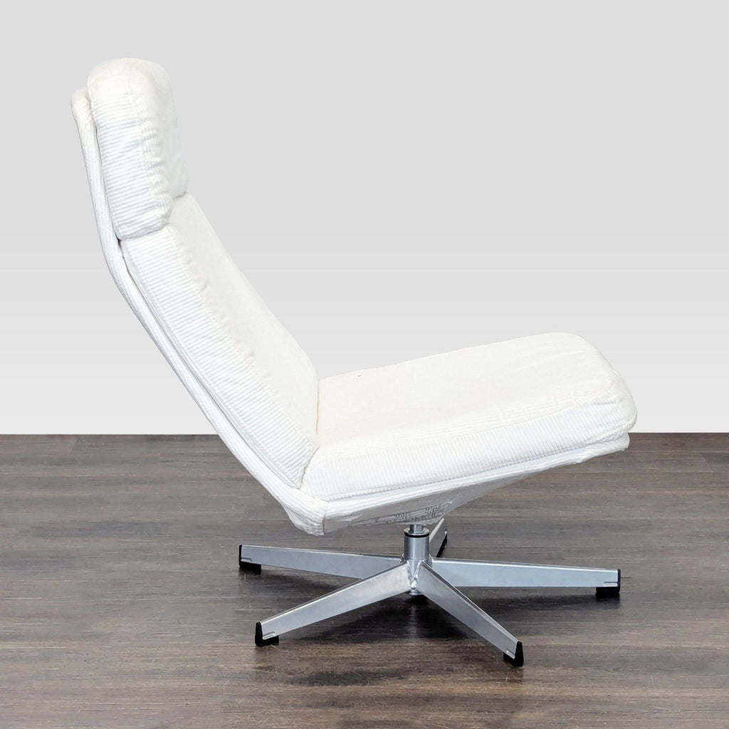 Comfortable white lounge chair from Ikea with a round swivel base, gently used and in great condition.