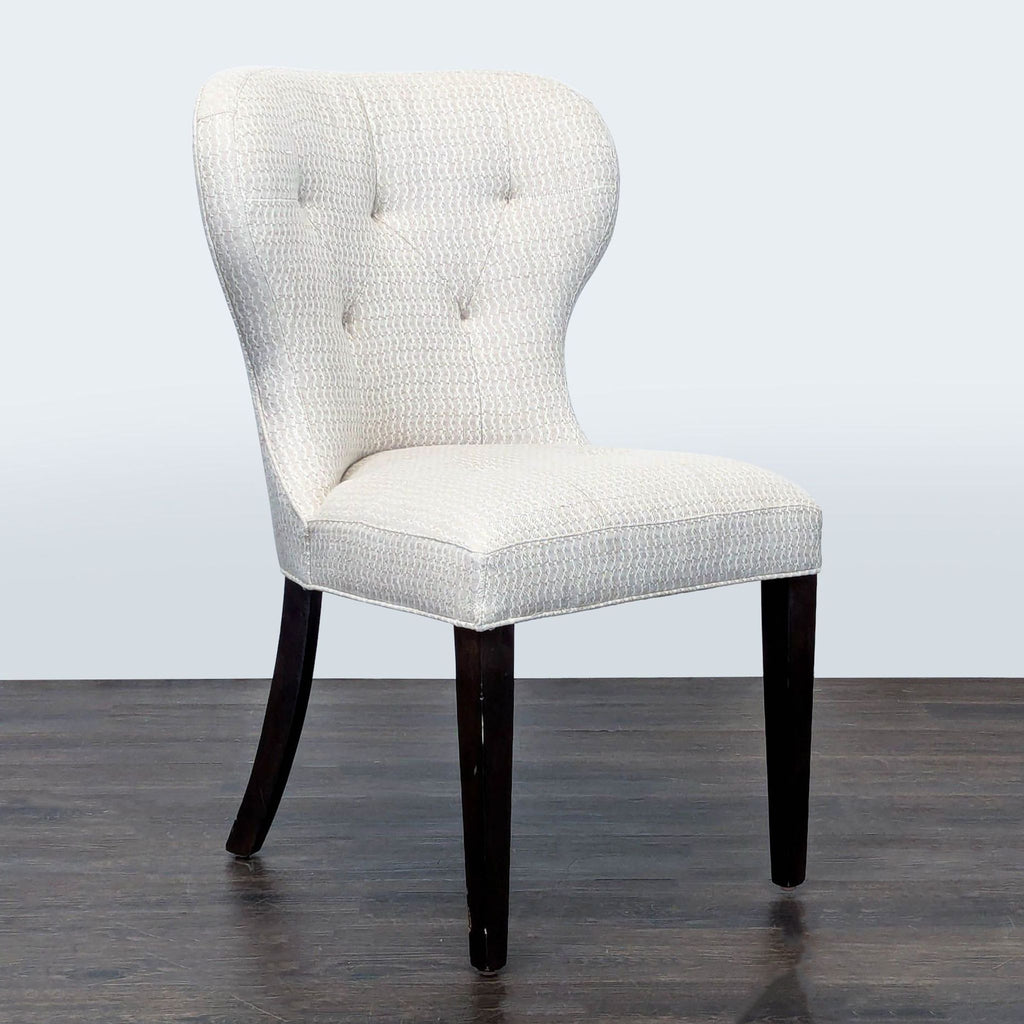 Elegant Cisco Brothers dining chair with a modern design, ideal for stylish dining spaces.