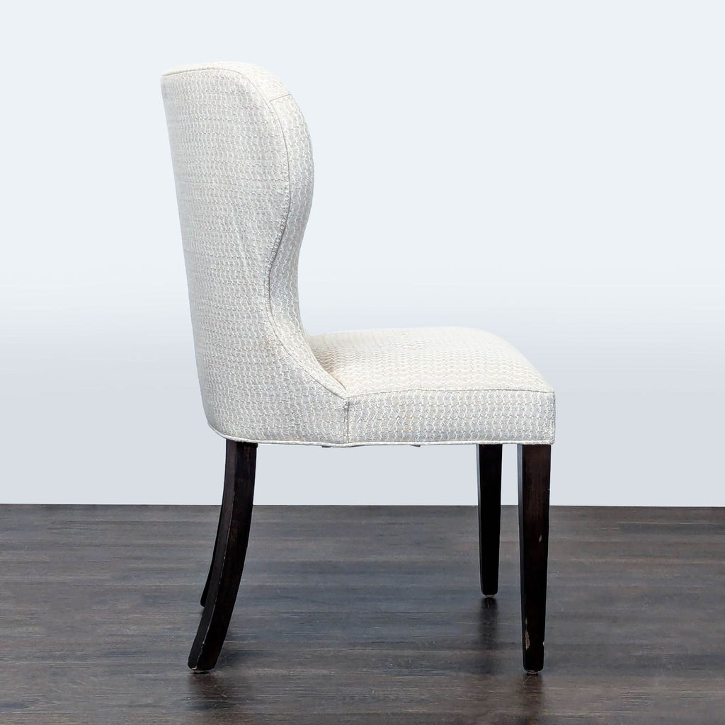 Contemporary dining chair by Cisco Brothers, perfect for comfortable and chic dining rooms.
