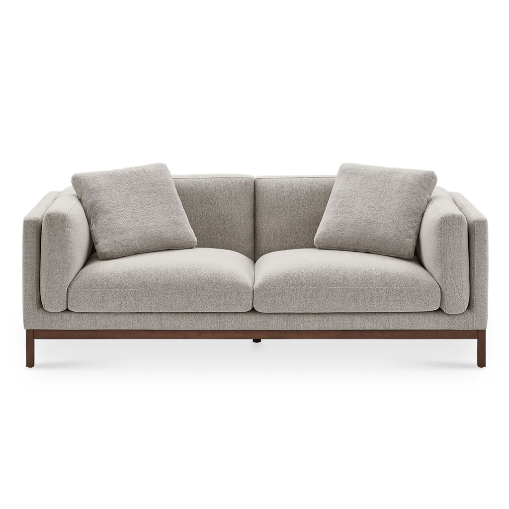 Castlery loveseat with opal beige fabric, plush cushions, and sleek wooden base in a modern style.